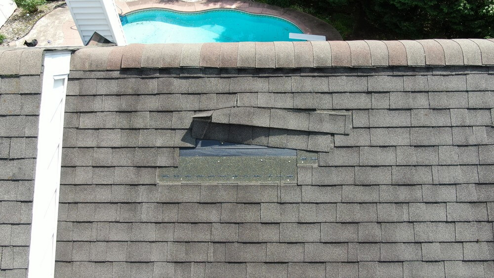 roof with storm damage