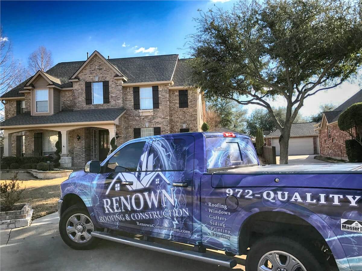 Renown Construction truck outside residential home
