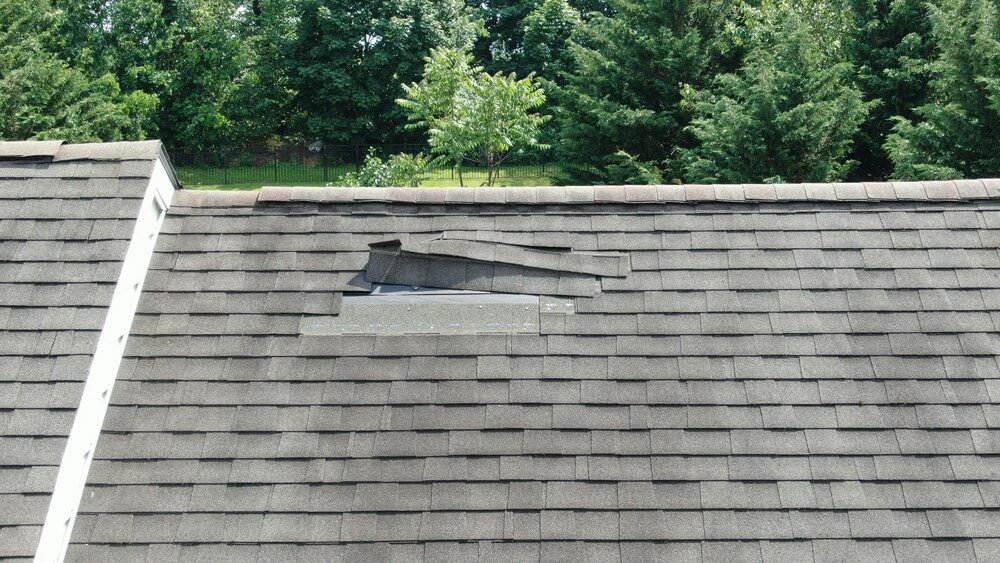 roof with storm damage