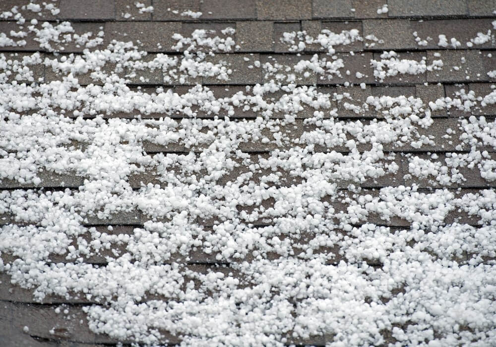 hail piled on rooftop