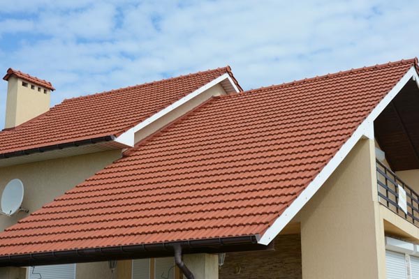 home with clay tile roofing